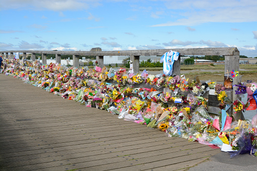 Brighton, England - September 4, 2015: Airshow crash disaster floral tribute and memorials on old bridge at Shoreham, West Sussex, England 2015