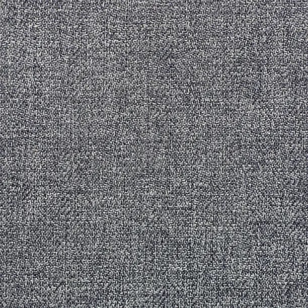 A very fine blue synthetics fabric texture background.