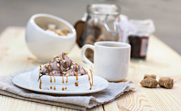 istock White meringues with brown chocolate stripes 495834678