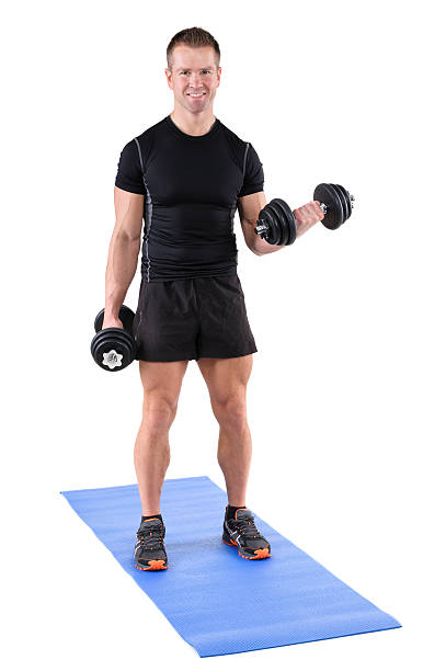 istock young man shows finishing position of biceps curl 495838042