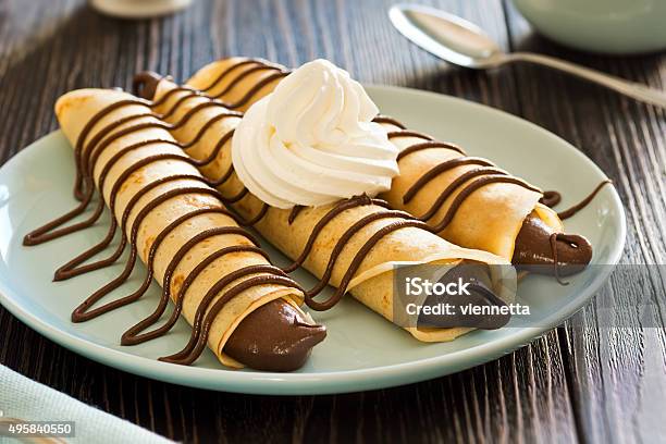 Chocolate Hazelnut Spread Crepes With Whipped Cream And Coffee Stock Photo - Download Image Now