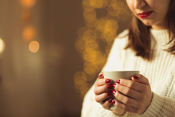 istock Woman with cup of tea 495841952