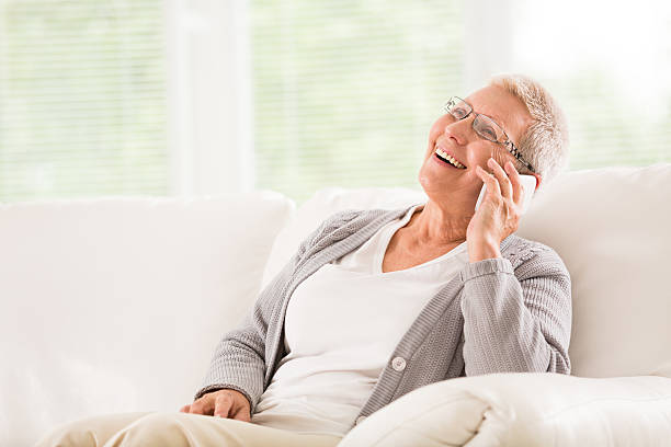 istock Senior woman talking on mobile phone 495853509