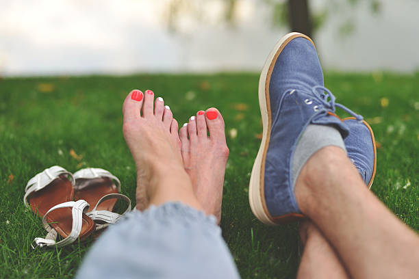 istock Young couple together in the grass 495853913