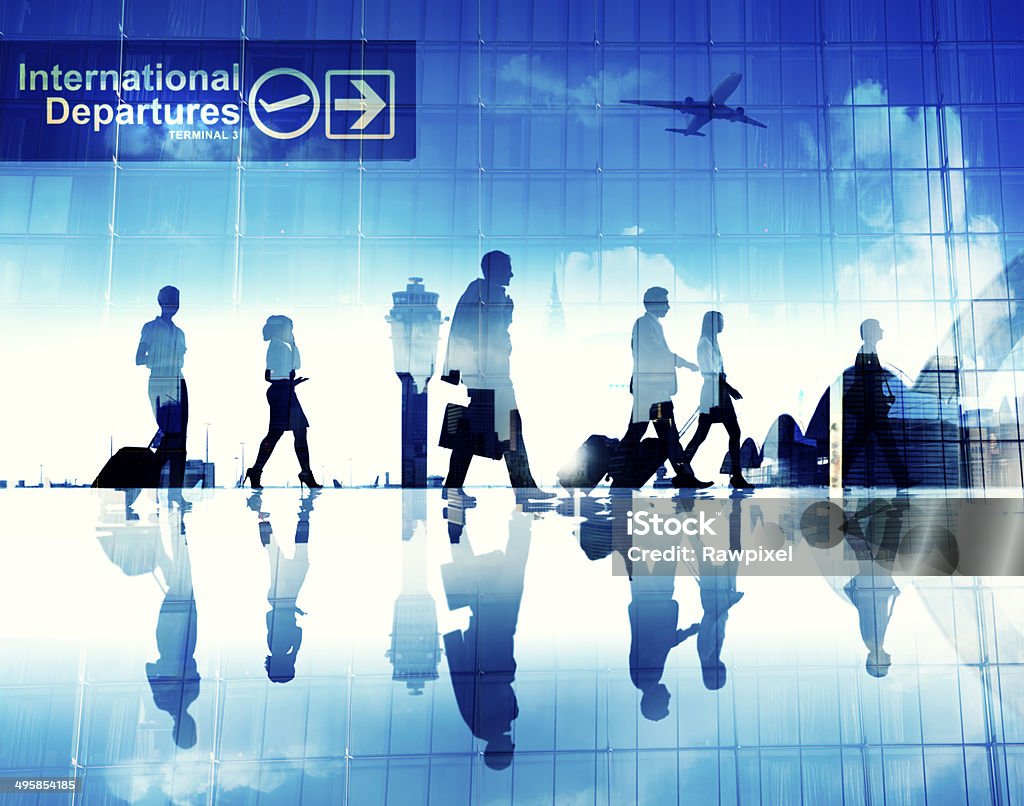 Business People Walking in the Airport Airport Stock Photo