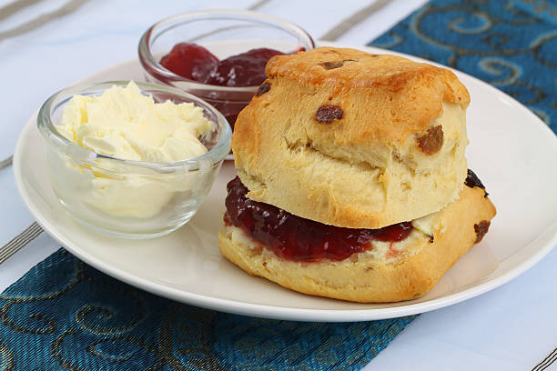 istock Homemade scone with jam and clotted cream 495855619