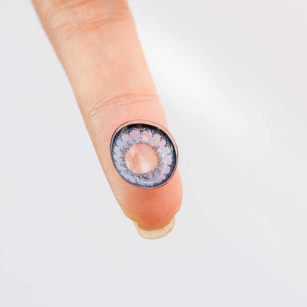 istock cosmetic contact lenses  hand 495858285