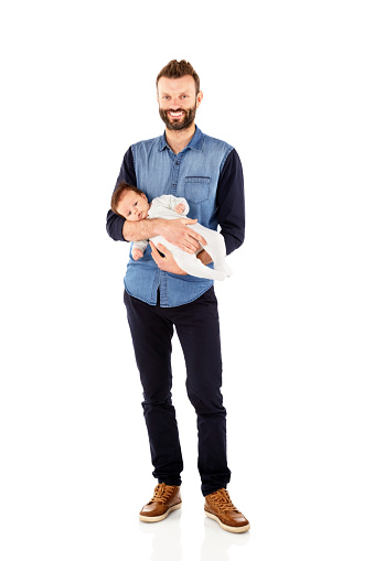 Full length portrait of young father with his little baby girl on white background
