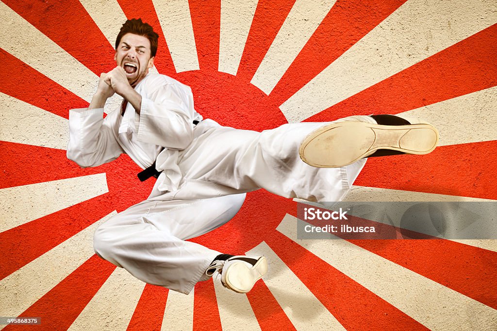 Martial art flying kick Karate Stock Photo