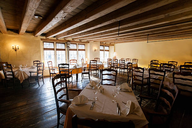 istock Tables and chairs arranged in restaurant 495868755