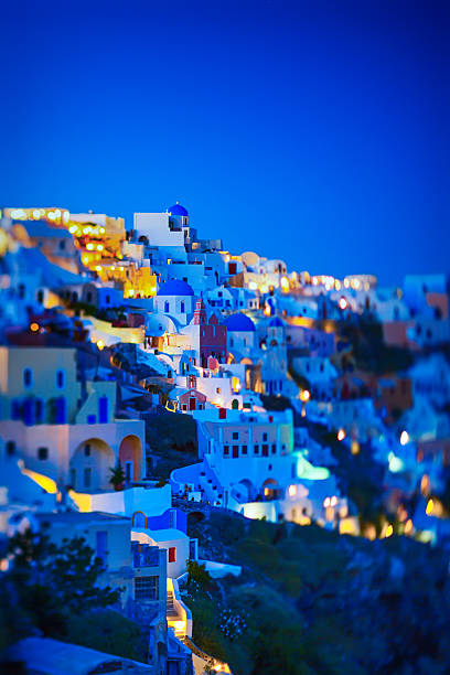 Traditional Greek village Oia (Ia) on Santorini island at dusk. Selective focus, tilf/shift lens used. Click for more images: 