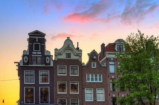 Beautiful canal houses at the little nine streets in Amsterdam, the Netherlands, at sunset