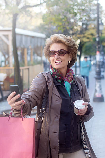 istock Shopping mature woman 495869942