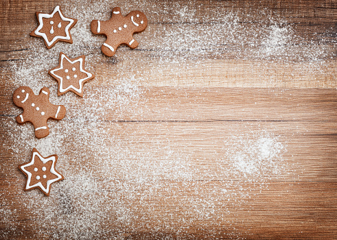 Gingerbread on wooden background