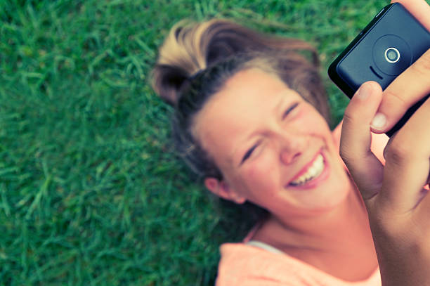 istock Girl taking a self portrait with a mobile phone 495870345