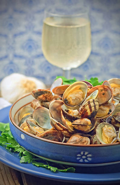 istock Clams soup with fresh parsley leaves 495870658