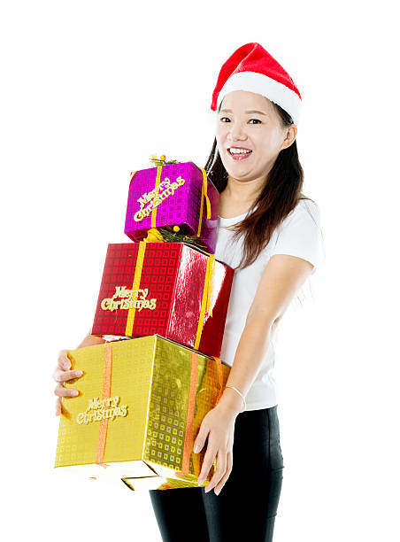 istock Asian woman with christmas presents 495870930