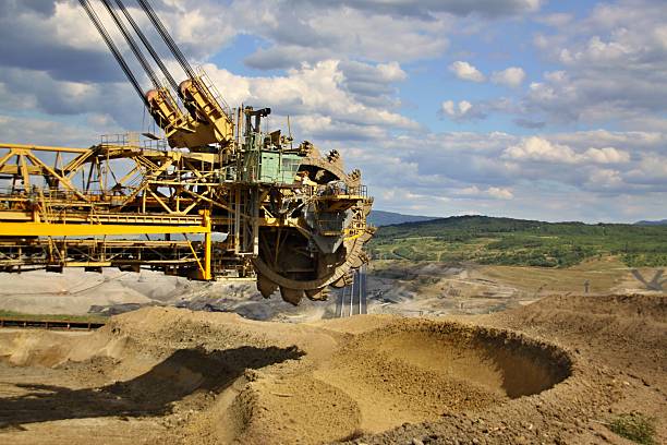 istock extraction of soil and excavator 495871026