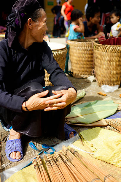 Ethnic groups in Nam market Ha Giang, Vietnam - September 20, 2015: Unidentified people of diferent ethnic groups in Lung Phin market. Lung Phin market is one of the most typical hill tribe markets in Vietnam. bac ha market stock pictures, royalty-free photos & images