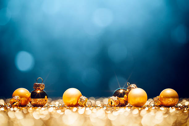 istock Golden Christmas Time - Decorations Lights Bokeh Defocused Blue Gold 495871652