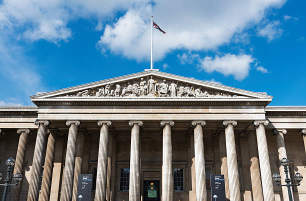 Columns main entrance to the British Museum in London London, United Kingdom - March 24, 2014: Front view of the main entrance to the British Museum in London, a centre dedicated to human history and culture. Established in 1753, it currently hosts a permanent collection that is among the largest and most comprehensive in existence,  illustrating and documenting the story of human culture from its beginnings to the present. british museum stock pictures, royalty-free photos & images
