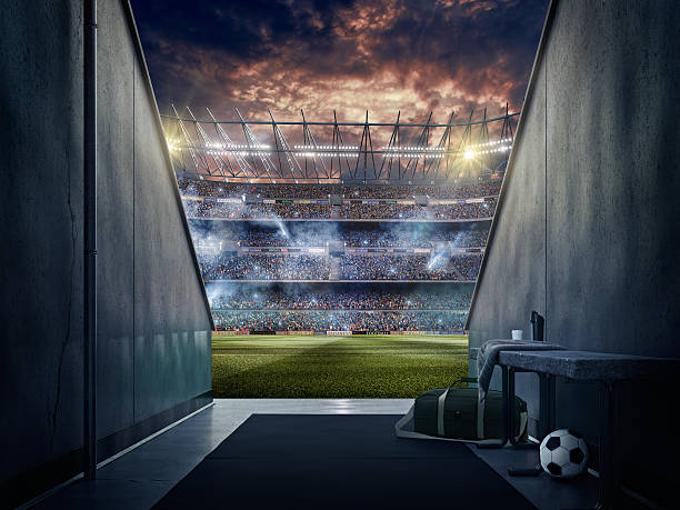 View to soccer stadium from players zone View to soccer stadium from players zone. Dramatic stadium with evening stormy sky. fitting room stock pictures, royalty-free photos & images