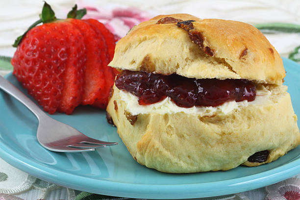 istock English scone with jam and clotted cream 495873457