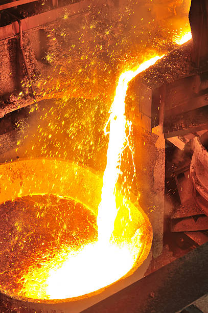 istock pouring molten metal 495873757