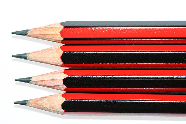 istock Line of sharp black and red lead pencils. 495874658