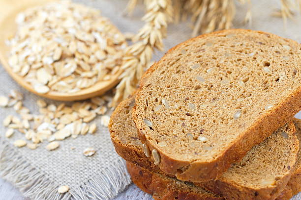 istock Healthy wholegrain bread on the wooden table 495876824