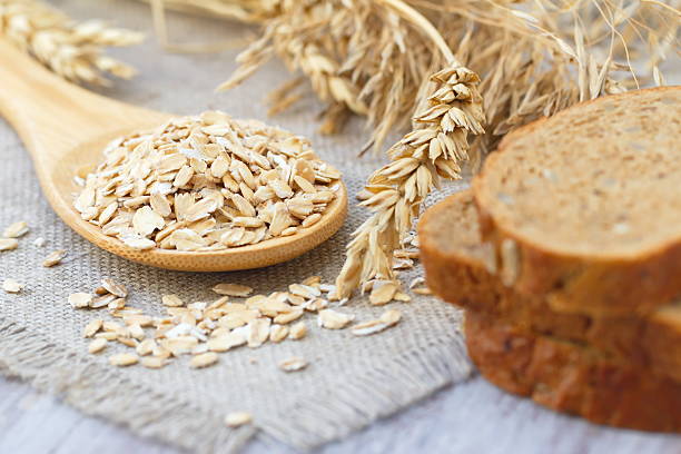 istock Oats with ears of cereal and bread 495877216