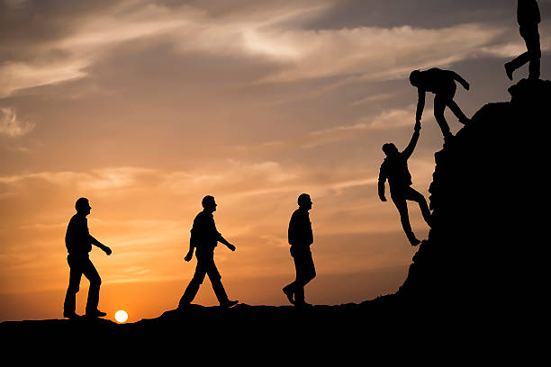 istock Silhouette of helping hand 495880422