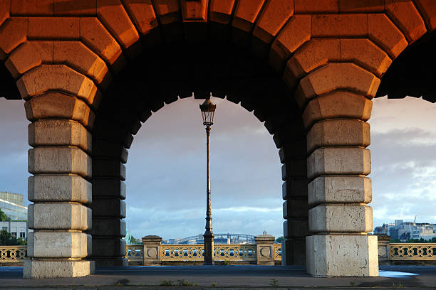 istock arch of Bercy bridge 495880844