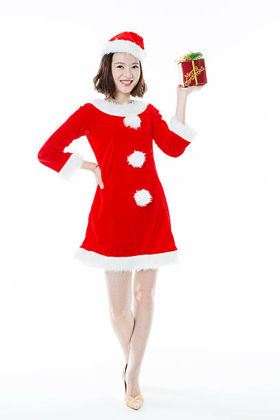 istock Santa girl with christmas gift box 495883146