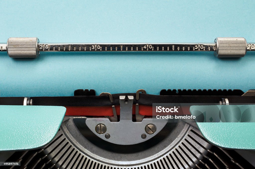 Vintage Typewriter Vintage Typewriter With Empty Blue Paper Sheet Typewriter Stock Photo