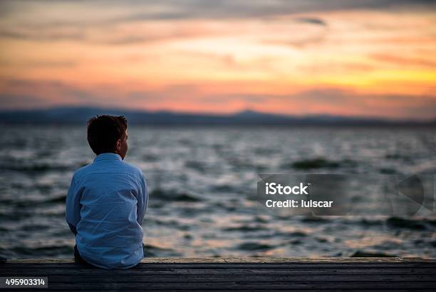 Boy Posing In The Lagoon Stock Photo - Download Image Now - 2015, Adolescence, Adult