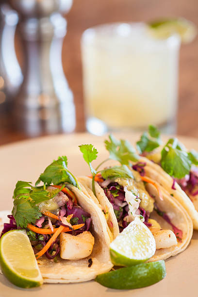 halibut tacos with avocado salsa verde and a margarita