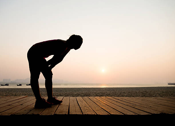 istock Silhouette of a tired runner 495908366