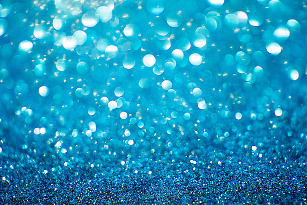 istock Abstract blue glitter background. Shiny glitter bokeh christmas 495909244