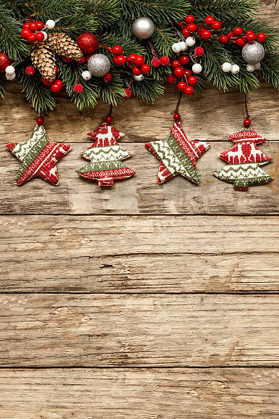 istock christmas decorations with ornaments on wooden background 495909366