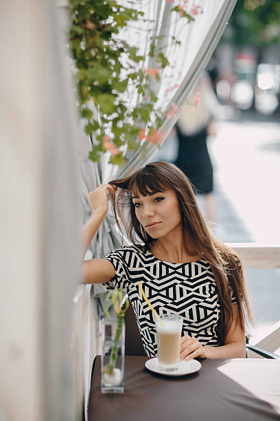 istock Girl in cafe 495909738