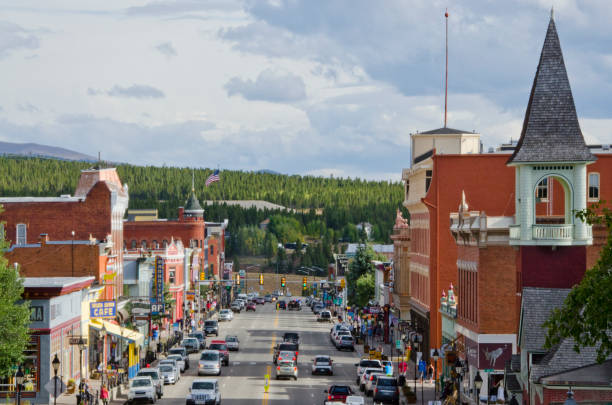 Downtown Leadville, Colorado in Summer Leadville, United States - September 6, 2015: Leadville, Colorado is famous for its mining past, but these days the gold is in tourism. Harrison Avenue, the main thoroughfare of this "two mile high" city, is full of locals and visitors alike on this summer afternoon. Many enjoy the shops, restaurants and saloons, but this National Historic District has been able to hold on to its Victorian mining roots, exemplified in all of the historic buildings and several museums in the area. leadville stock pictures, royalty-free photos & images