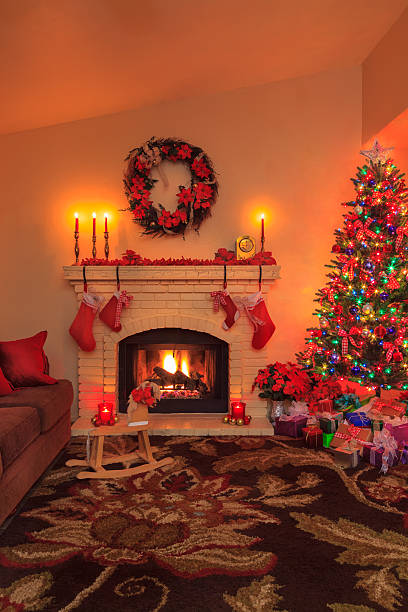 istock Christmas fireplace with tree, rocking horse,candles (P) 495911810