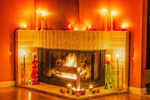 istock Romantic Fireplace decorated in Candlelight and cheery fire (P) 495911818