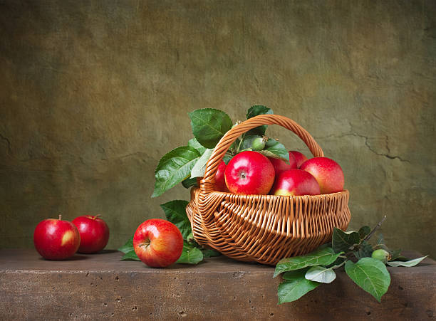 istock Still life with apples in a basket 495913245