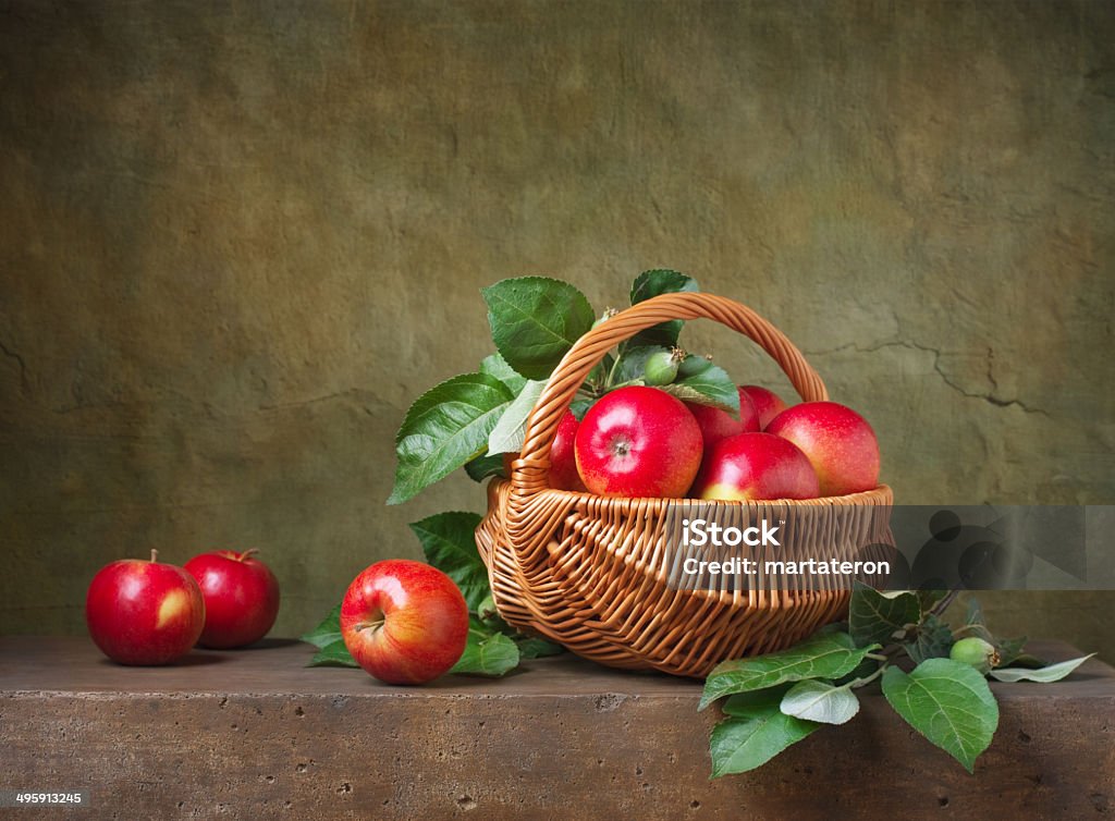 Still life with apples in a basket Apple - Fruit Stock Photo