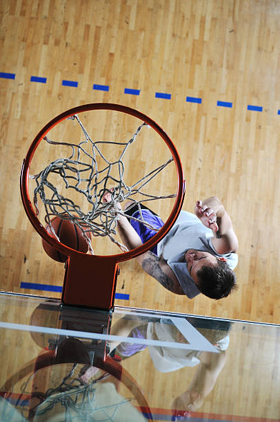 istock basket ball game player at sport hall 495914319