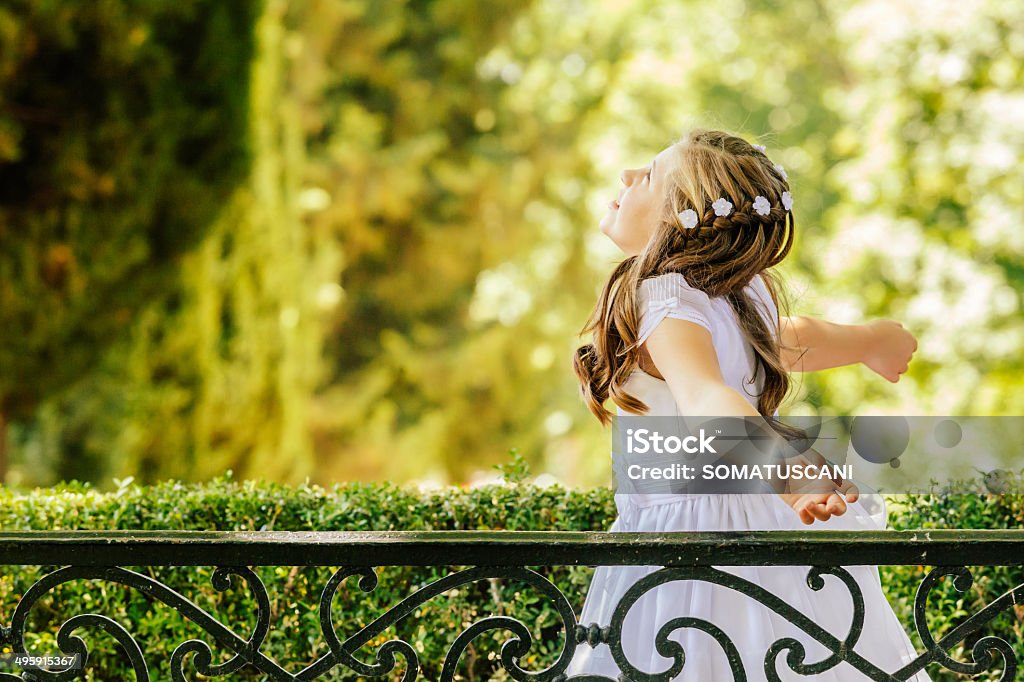 Girl in her First Communion Day Little Girl in her First Communion Day Catholicism Stock Photo