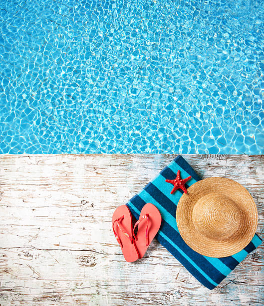 istock Summer accessories on wooden planks 495917423