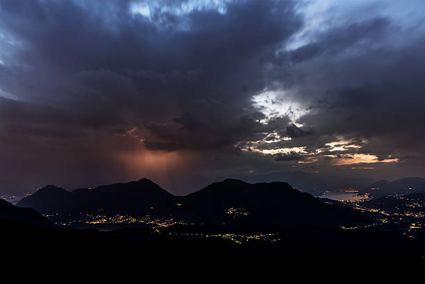 istock Thunderstorm over mountains at the horizon 495918093